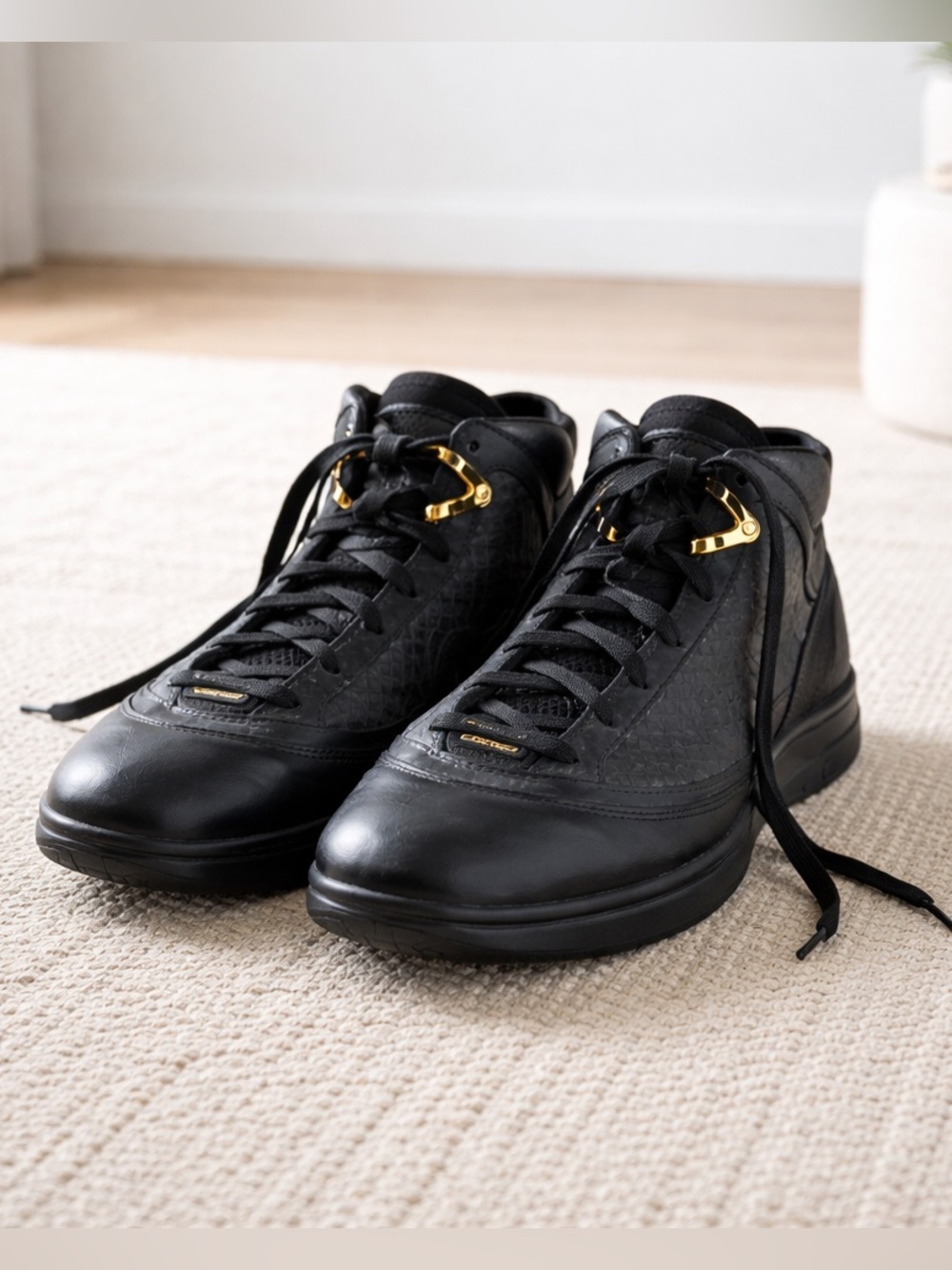 Nike Black High-Top Sneakers with Gold Accents
